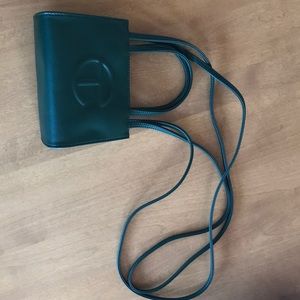 Brand new Telfar small dark olive bag. Used once.